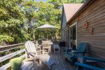 Plenty of seating on the expansive back deck for reading a book or catching a tan 